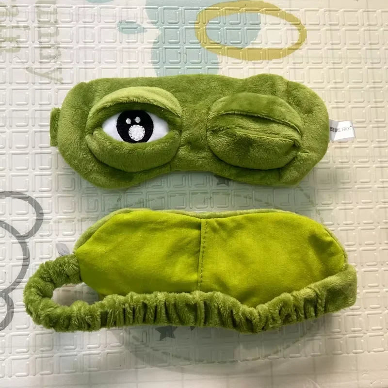 Front and back view of the green frog sleep mask